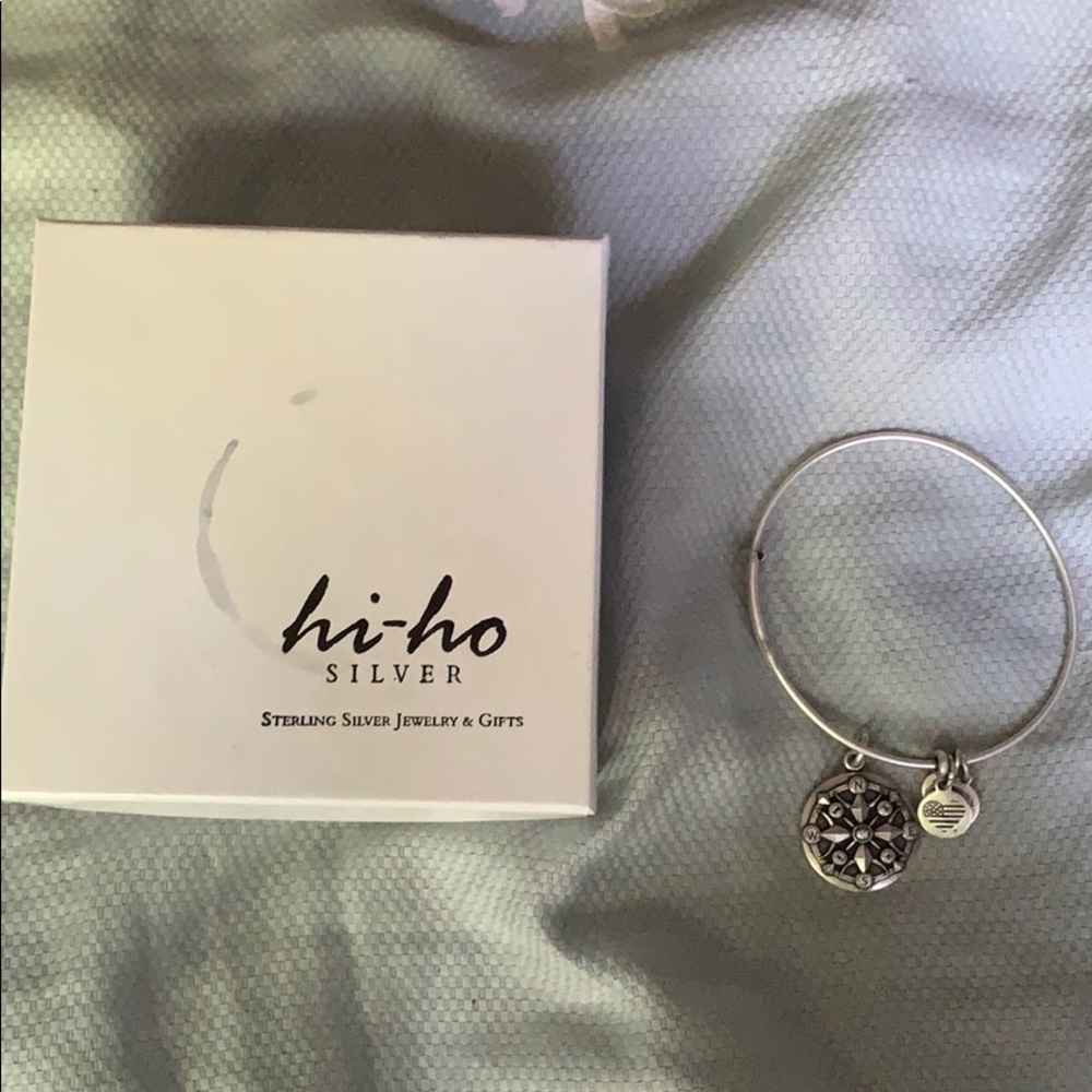 Sterling silver compass charmed bracelet